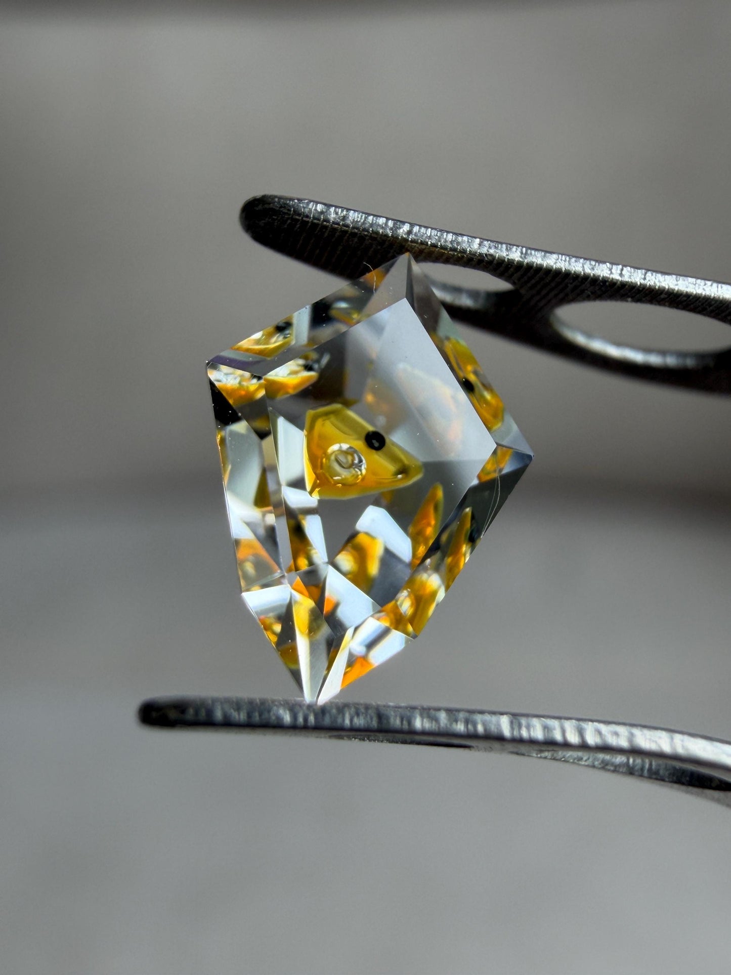 0.75ct Hand-Cut Shield Petroleum Quartz | Unique Golden Enhydro Crystal