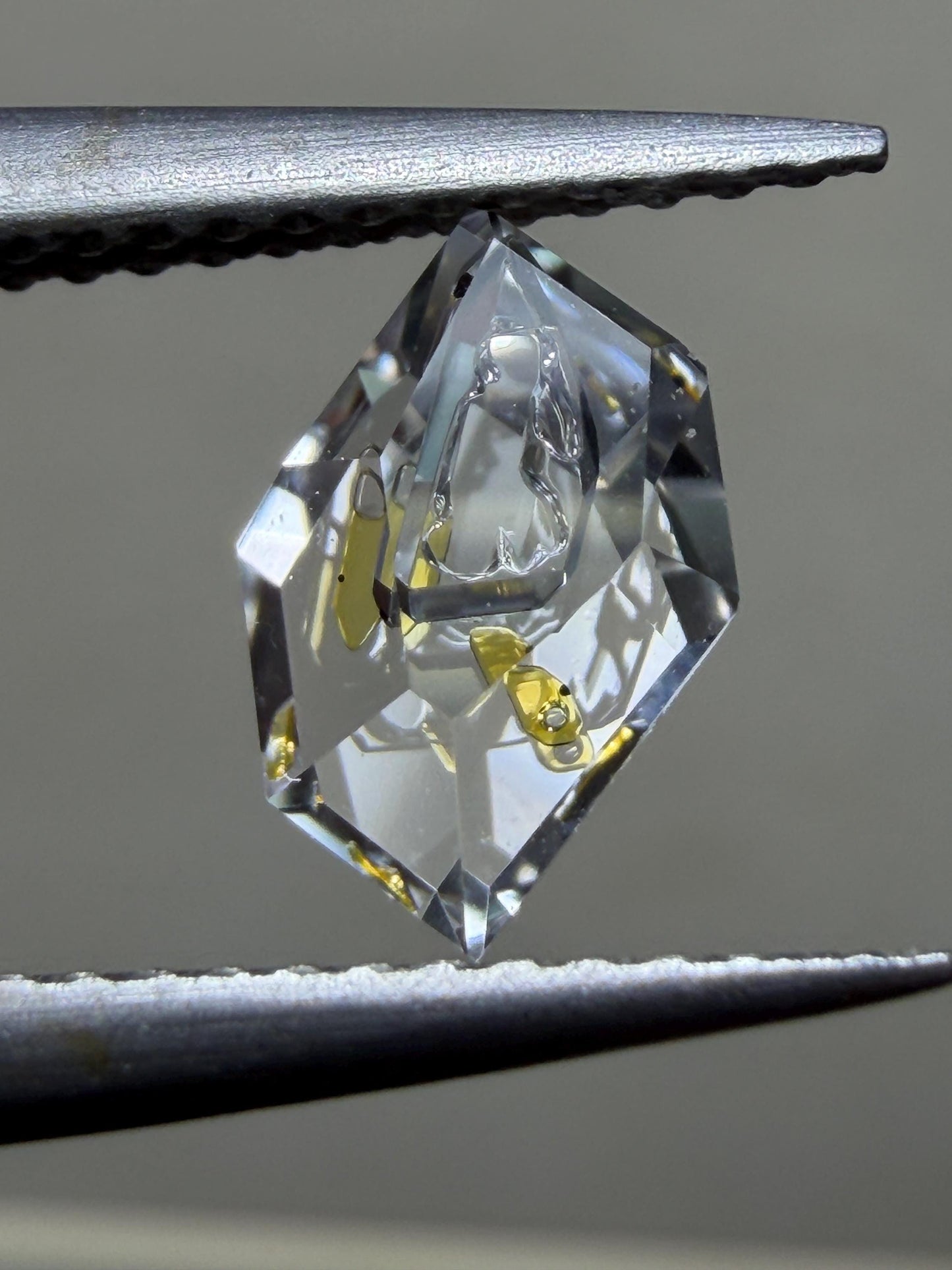 0.57ct Hand-Cut Octagon negative crystal Petroleum Quartz | Golden Enhydro Crystal