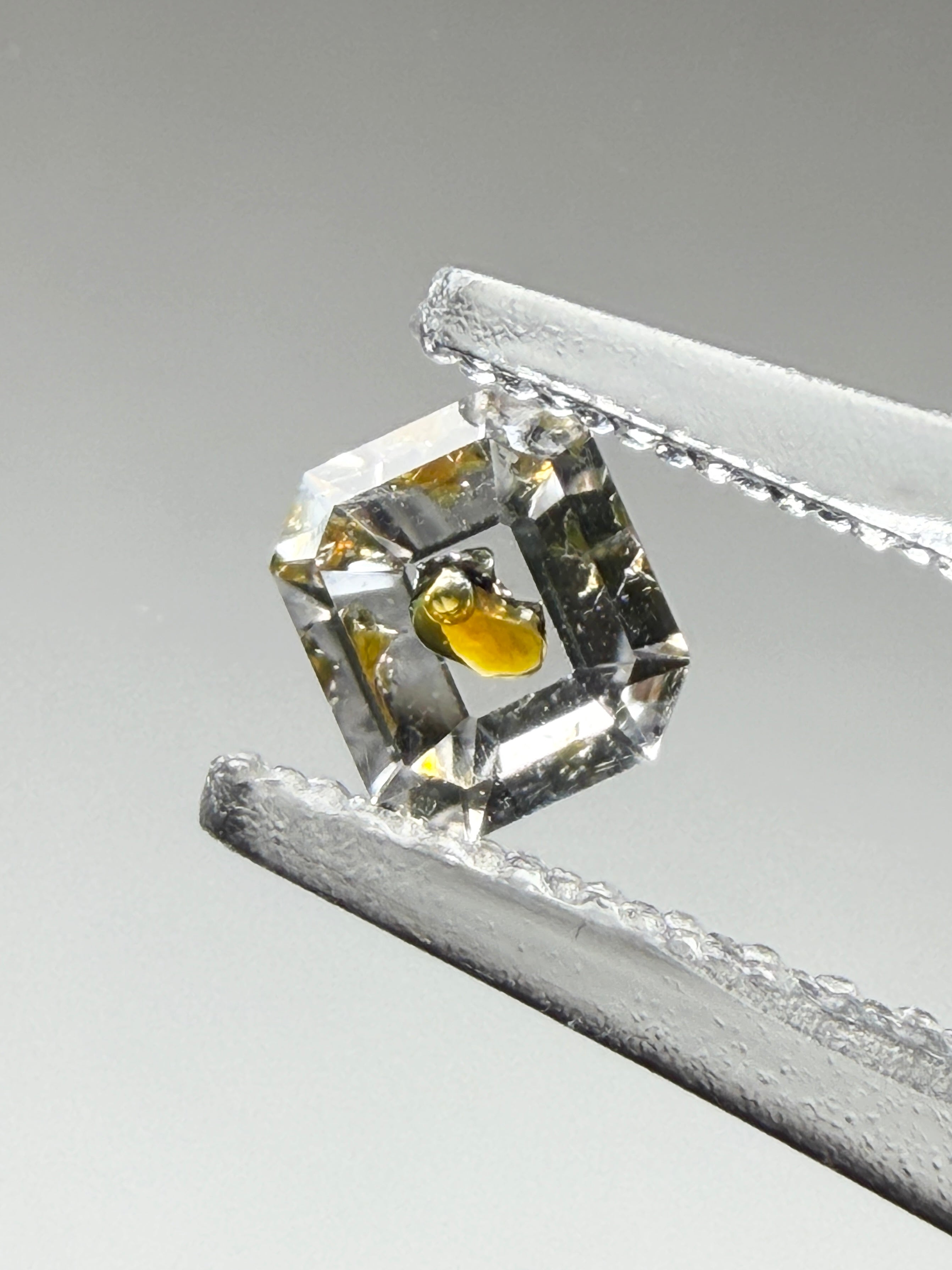 Natural Petroleum Quartz – 0.21 ct Octagon Emerald Cut – Fluid Inclusion with Moving Bubble