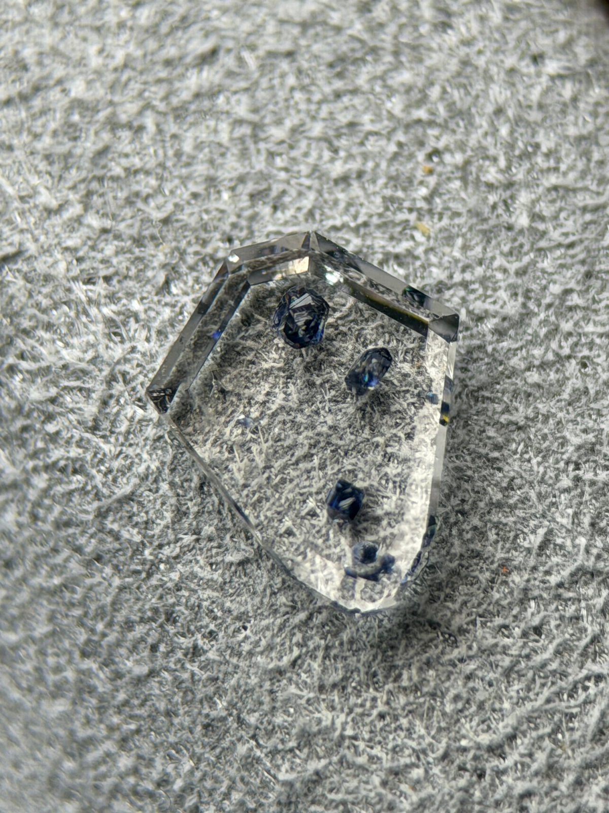 Natural Anatase in Quartz – 0.42 ct Shield / Geometric Cut (5.2 x 6.2 mm) – Mozambique – Floating Metallic Crystal Inclusions