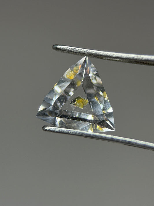 0.46 ct Trillion Cut Petroleum Quartz with Fluorescent Inclusion – Madagascar