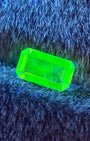 Mexican Hyalite – 0.48 ct Emerald Cut / Baguette Cut (4.0 x 7.4 mm) – Intense Green UV Fluorescence