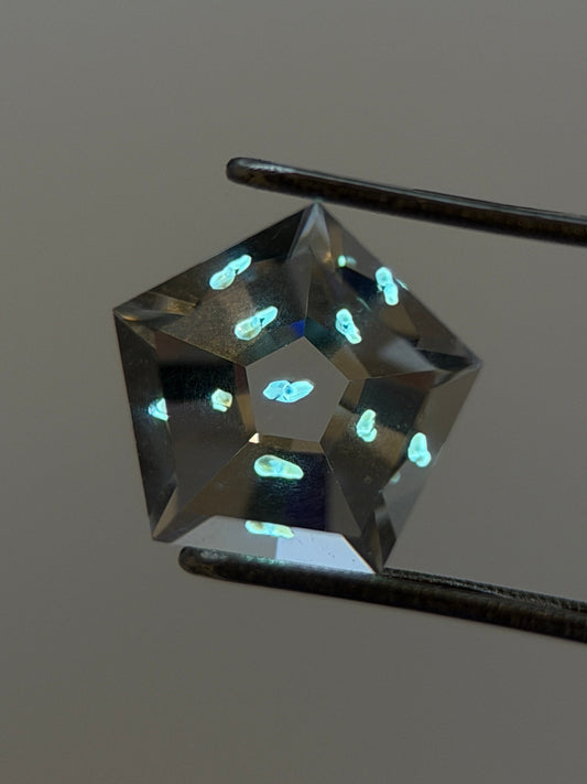 0.62 ct Pentagon Cut Petroleum Quartz with Enhydro Moving Bubble – Madagascar