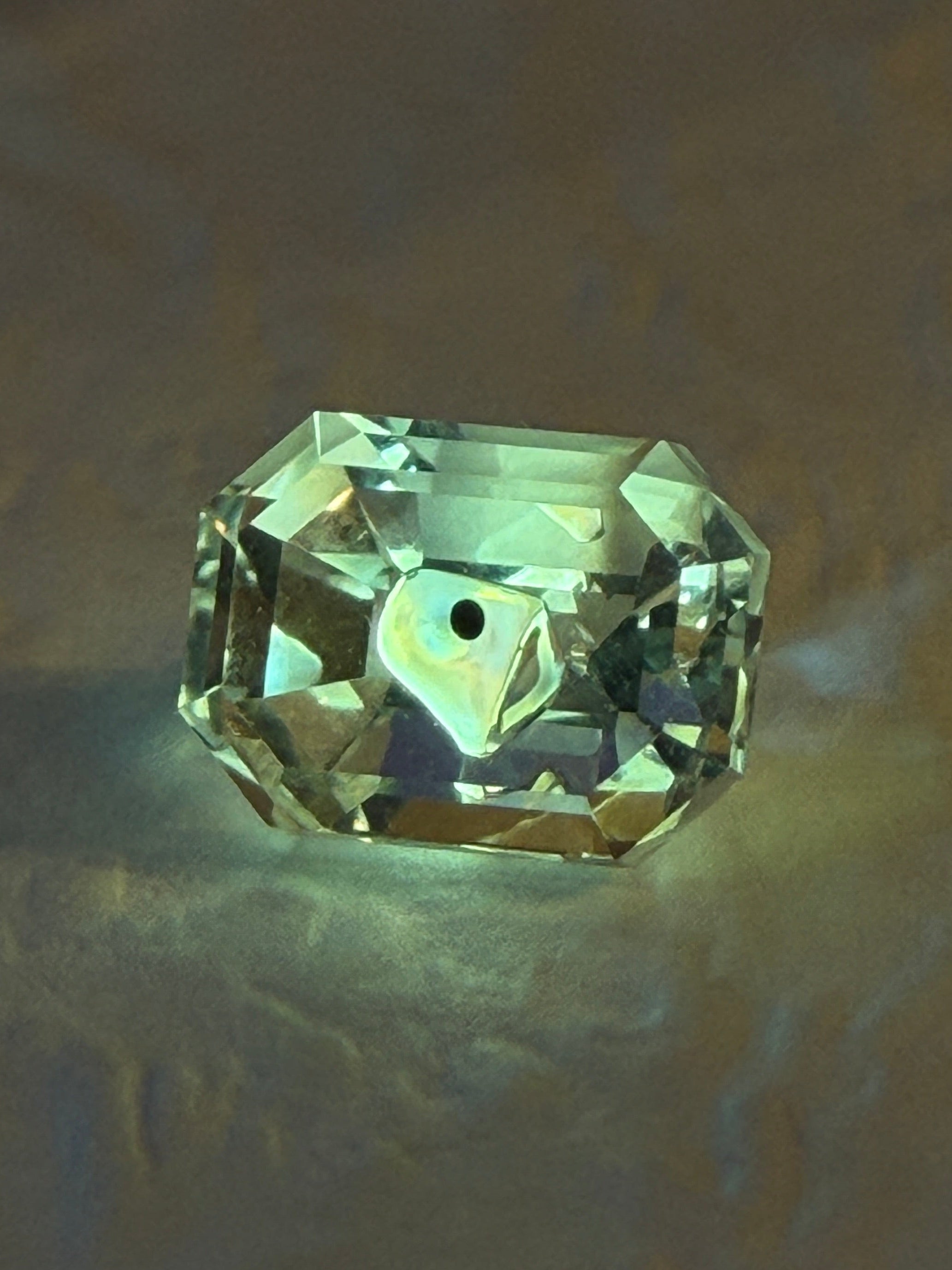 Natural Petroleum Quartz – 0.74 ct Emerald Cut (5.8 x 4.3 mm) – Fluid Inclusion with Moving Bubble