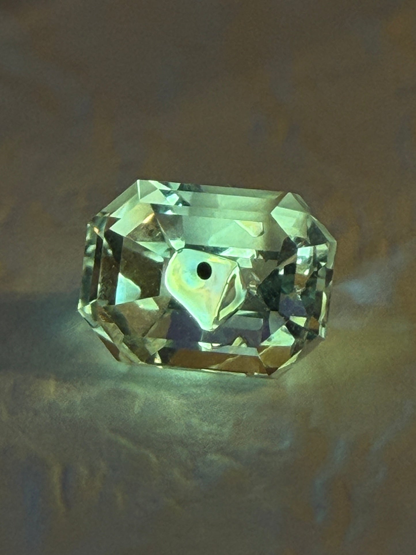 0.74 ct Emerald Cut Petroleum Quartz with Enhydro Moving Bubble – Madagascar (5.8 x 4.3 mm)