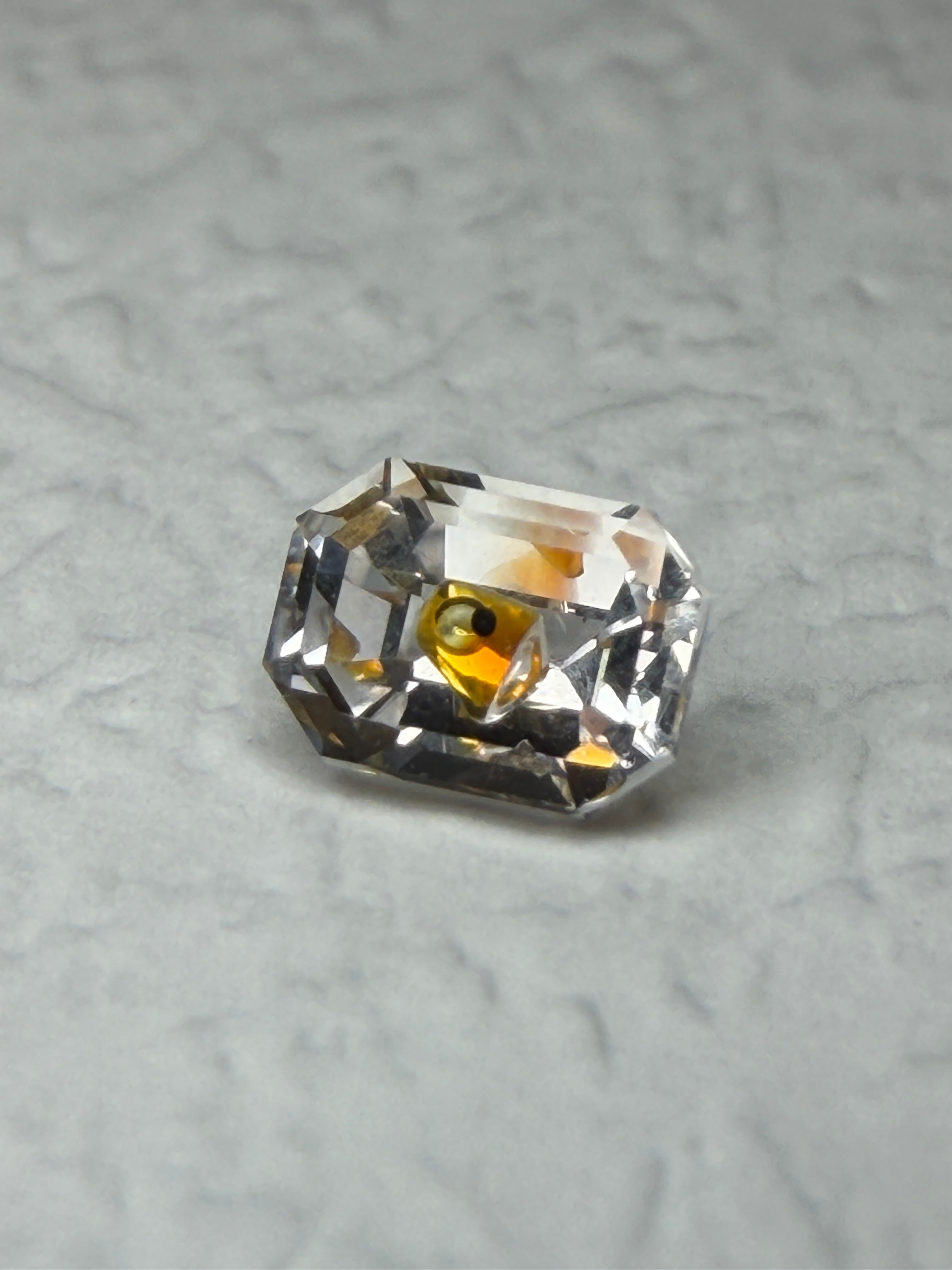 Natural Petroleum Quartz – 0.74 ct Emerald Cut (5.8 x 4.3 mm) – Fluid Inclusion with Moving Bubble