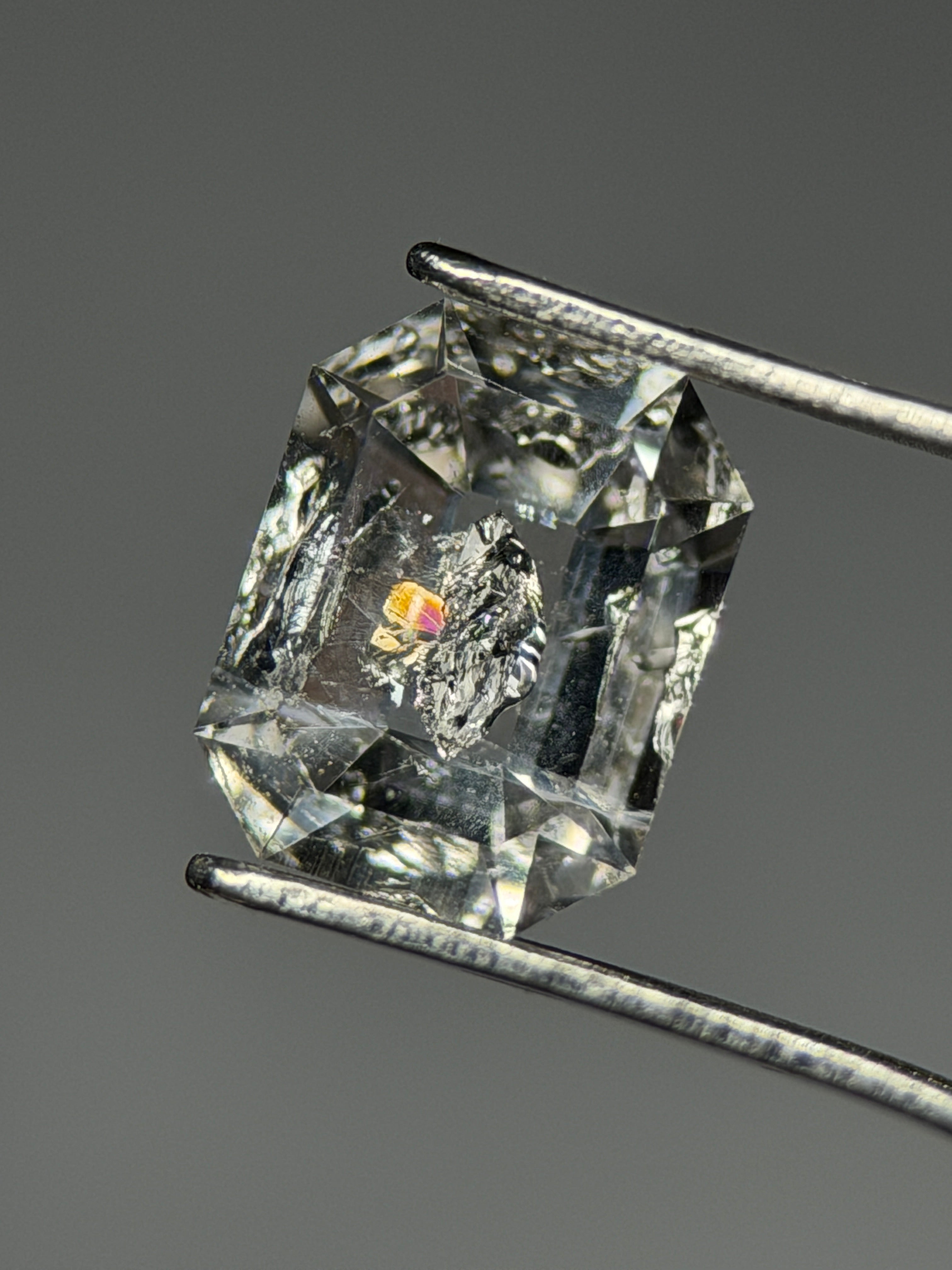 Natural Petroleum Quartz – 0.75 ct Octagon Cut (4.9 x 6.3 mm) – Rainbow Iridescence & Black Mineral