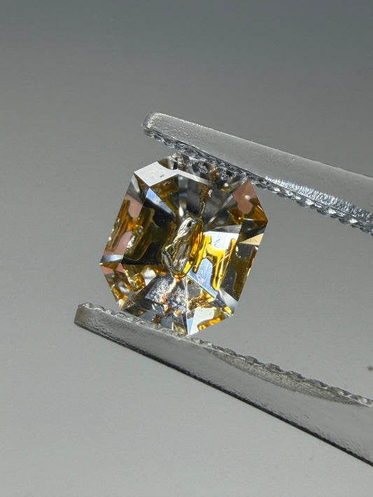 0.79 ct Emerald Cut Petroleum Quartz with Fluorescent Negative Crystal – Madagascar (6.3 x 5.2 mm)