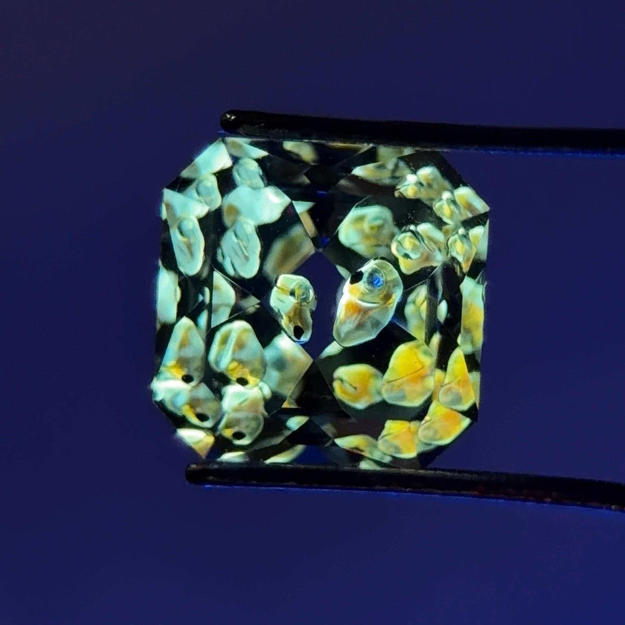 天然石油水晶 – 1.09 克拉八角形切割（6.0 毫米）– 雙石油腔體內含可移動氣泡
