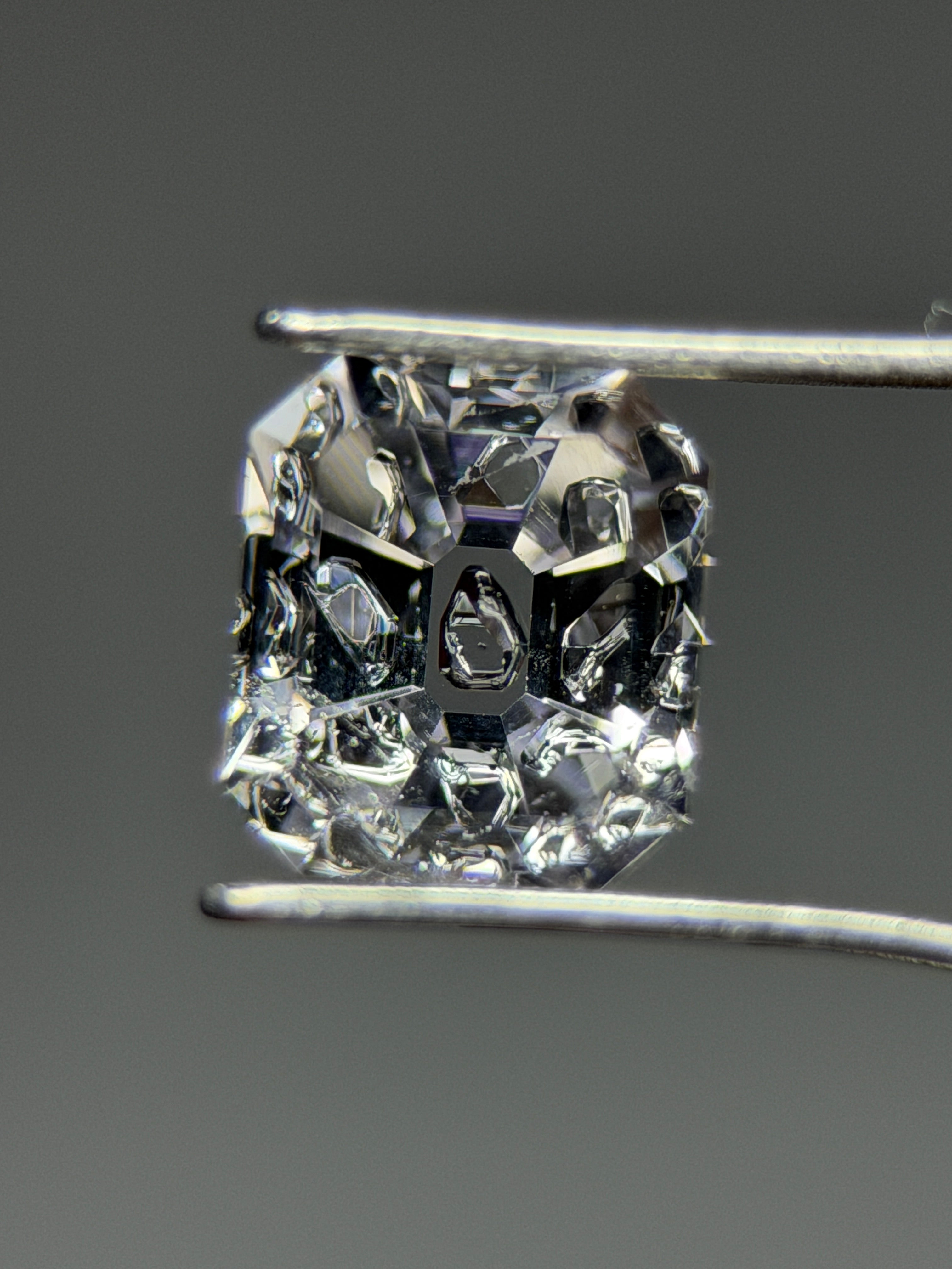 Natural Fluorescent Quartz – 1.11 ct Octagon Cut (5.4 x 6.2 mm) – Intense Blue Fluorescent Chamber