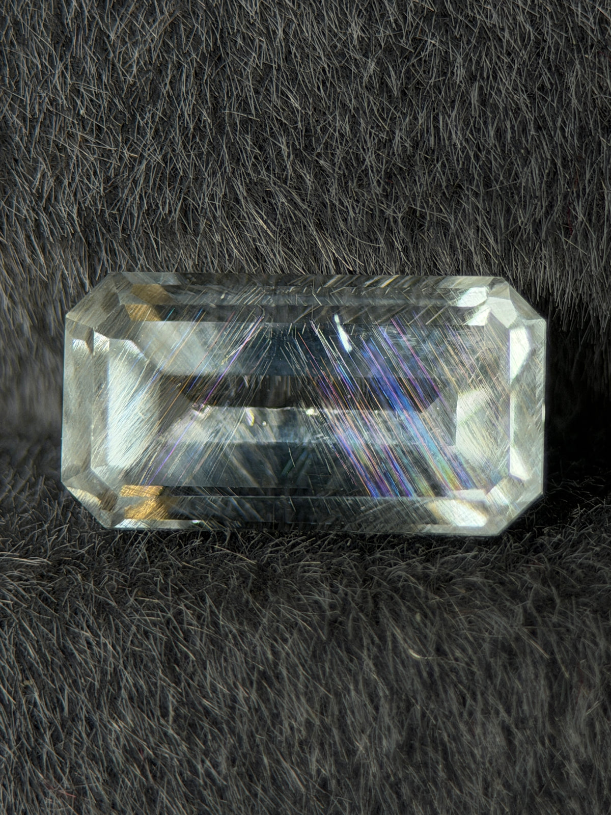 Natural Rainbow Topaz – 4.62 ct Geometric Emerald Cut (12.2 x 6.5 mm) – Iridescent Inclusion Sheen