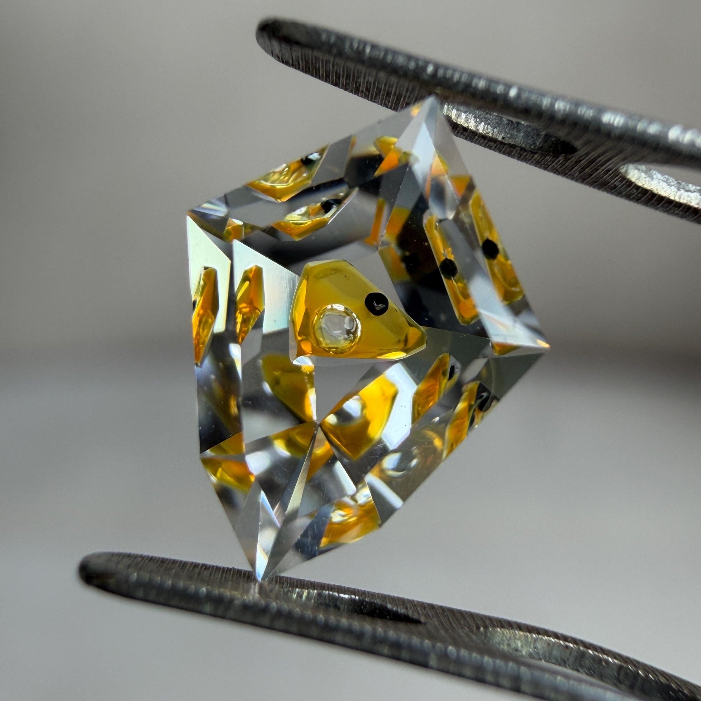 0.75ct Hand-Cut Shield Petroleum Quartz | Unique Golden Enhydro Crystal