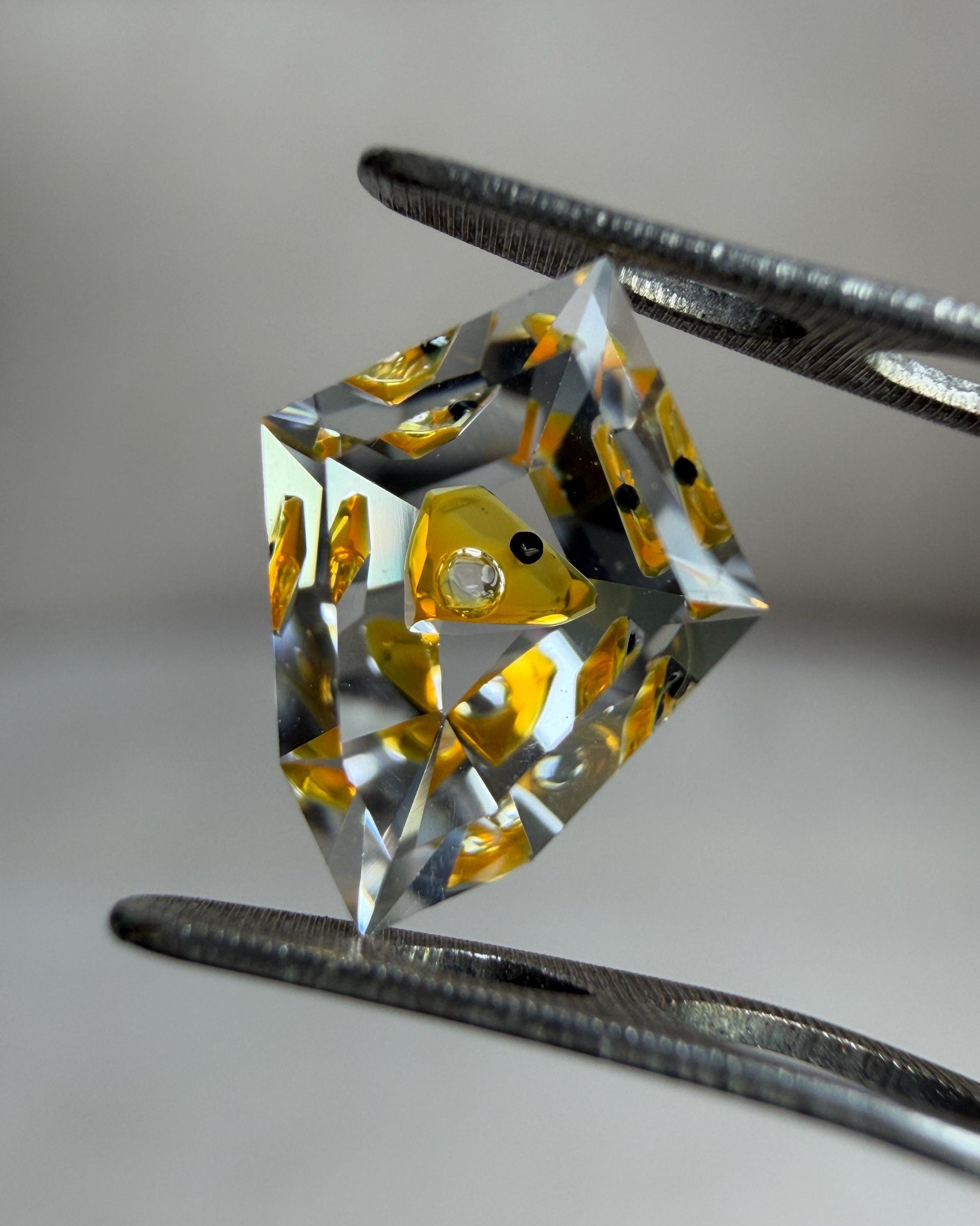 0.75ct Hand-Cut Shield Petroleum Quartz | Unique Golden Enhydro Crystal