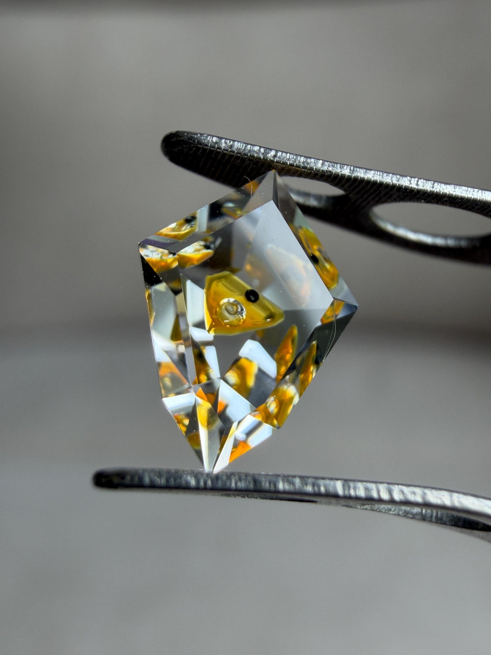 0.75ct Hand-Cut Shield Petroleum Quartz | Unique Golden Enhydro Crystal
