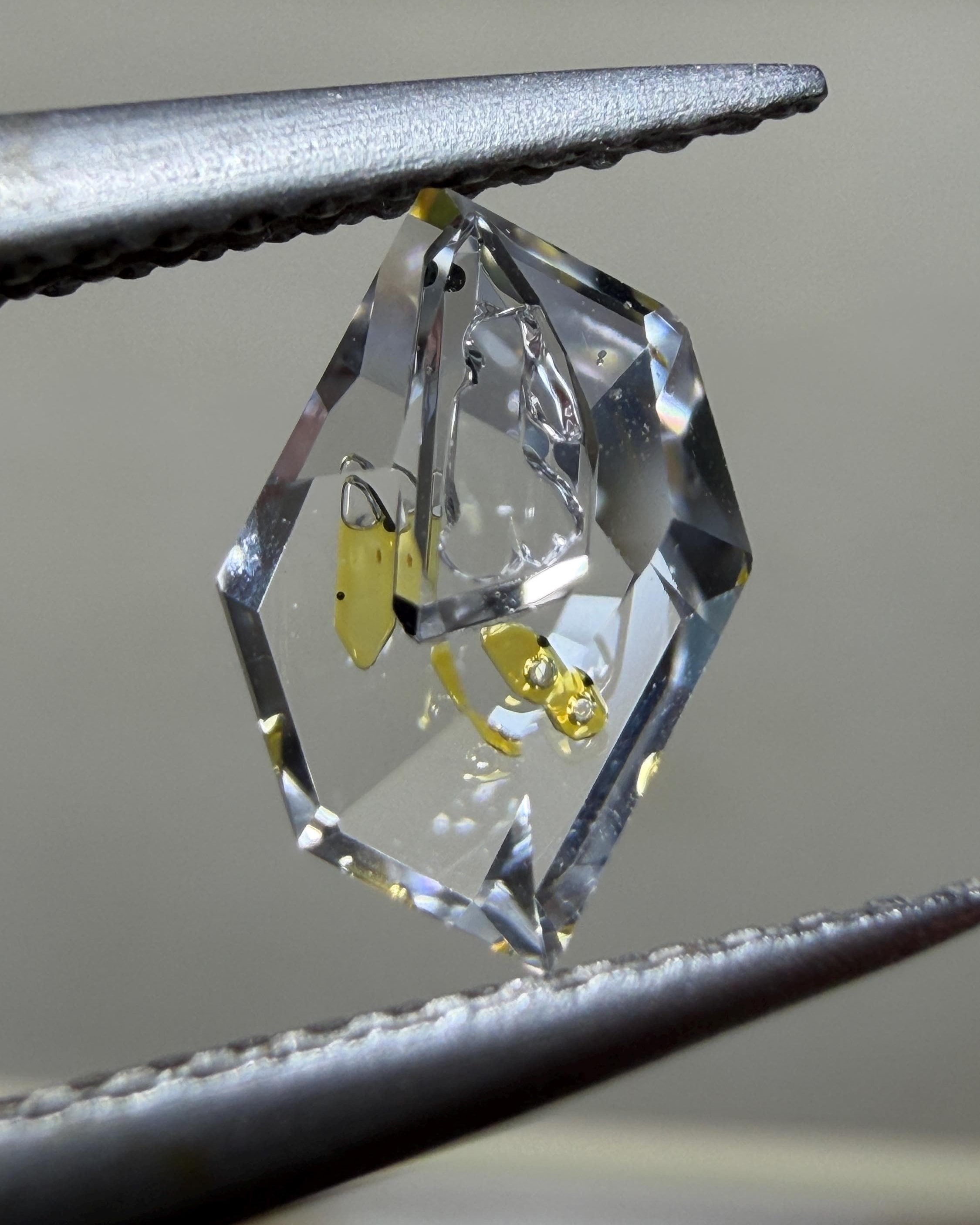 0.57ct Hand-Cut Octagon negative crystal Petroleum Quartz | Golden Enhydro Crystal